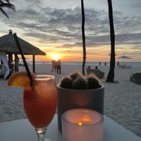 The best time to come is sunset at Elements Restaurant in Oranjestad