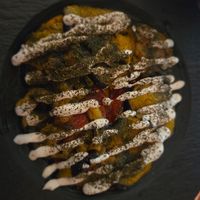 Fried aubergine and tomato with vegan garlic sauce at Bread and Wine in Tromsoe