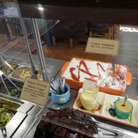 The desserts buffet with signs as to what is vegan at La Faim Des Haricots in Blagnac