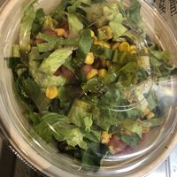 Lettuce , pico de gallo, guacamole , pickle onion, corn , mango vegan dressing   at Hot Peppers in Long Island City