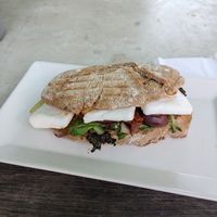 Bog slabs of vegan cheese, served warm or cold. at Little Green Rabbit  in Berlin