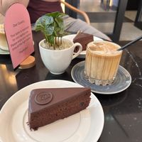 Sacher Cake and coffee with oat milk  at Elias Coffee Shop in Vienna