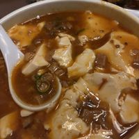 Silken tofu in spicy sauce   at Tofu Vegan - Charlotte in London