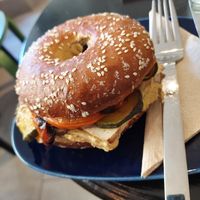 Bagel with humus, tofu and grilled vegetables. at Miri‘s Café in Passau