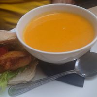 Soup of the day (carrot with harissa) and the sourdough bun with tofish at Mono in Glasgow