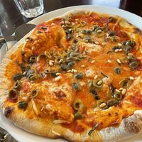 Pizza -olive, caper, pine nut and vegan mozzarella  at Mono in Glasgow