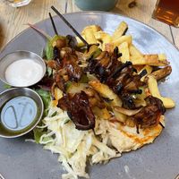 Oyster mushroom skewers with chips, hummus & slaw  at Mono in Glasgow