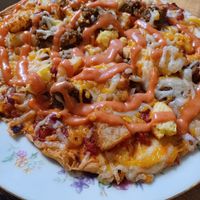 I enjoy the Flat Bread Specials; Buzz enjoys the Buddha Bowl at The Red Fern in Rochester