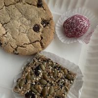 Chocolate chip cookie, Beet-Coconut Bite (oil-free), and a Bird Bar (oil-free).  at The Red Fern in Rochester