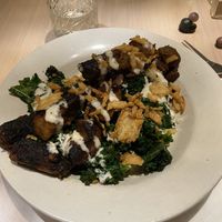 Steak, mashed potatoes, greens, fried onions,with a horseradish drizzle. Awesome!! at The Red Fern in Rochester