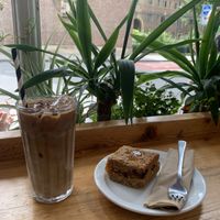 Iced soya latte and gf vegan apricot slice  at Bridges in Cambridge