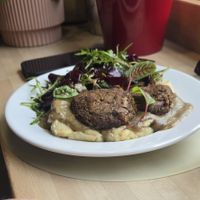 Lentil patty with potatoes and beet salad at NO TU OliDeli in Warsaw