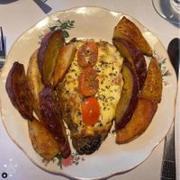 eggplant milanesa with vegan cheese potatoes and sweetpotatos at La Cocina de la Abuela en Bariloche in San Carlos De Bariloche