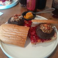 Rafalafel, con chukrut y decorado con semillas. at Los Vampiros Emparedados in Puebla