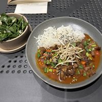 “Duck” in sweet and sour sauce and amazing spinach salad.   at Manna 2 in Warsaw