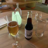 Alcohol free orange sparkling wine, cola  at Manna 2 in Warsaw