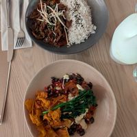 cauliflower steak and duck with rice at Manna 2 in Warsaw