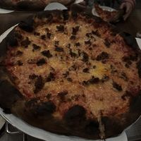 The black pizza was sent back & the second pizza that came out still had a very nasty burnt taste it was literally not edible.. I really really wanted to like this place. For $35+  at Wheated in Louisville