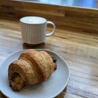 Creamy mushroom croissant and oat milk latte at Luna Bakery in Loughborough