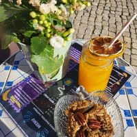 Orange juice and apple muffin at Put It On Lisbon in Lisbon