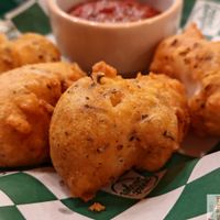 mozzarella sticks with golden breadcrumbs served with tomato sauce at Neat Burger - Porta Venezia in Milan