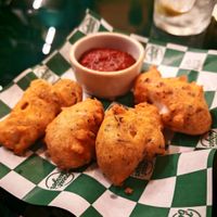 mozzarella sticks with golden breadcrumbs served with tomato sauce at Neat Burger - Porta Venezia in Milan