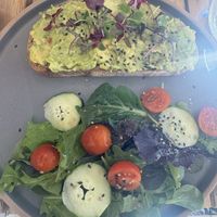 Avocado toast with salad  at super be in Barcelona