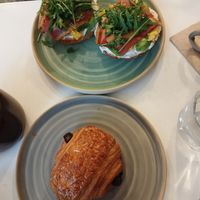 Breakfast bagel and pain au chocolat at Bistro Deppat in Vienna