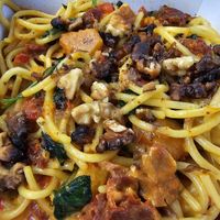 Creamy spaghetti with sundried tomatoes, fire roast peppers, spinach, walnuts, butternut and soya cream at  Prego in East Cowes