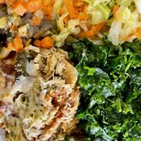 Lasagna, kale salad, Cole slaw and black eyed peas    at Kale Cafe Vegan Kitchen in Daytona Beach