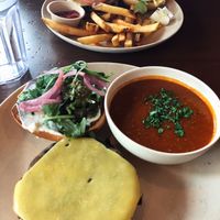 Top: steakhouse burger & fries; Bottom: quinoa and veggies burger & lentil soup at Veggie Grill by Next Level in Westlake Village