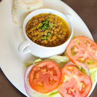 Vegano: Deliciosas lentejas con arroz y ensalada mixta (lechuga, tomate y cebolla).

Vegan: Delicious lentils with rice and mixed salad (lettuce, tomato and onion). at Delicateses Criollas in Recoleta