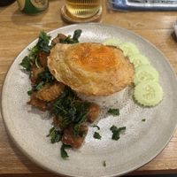 Stir fried pork with basil, rice and a vegan fried egg!!!  at Kem-Kon KhaoSan (เข้ม-ข้น ข้าวสาร) in Bangkok