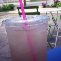 Lavender lemonade in the outdoor seating area at Rainbow Bakery in Bloomington