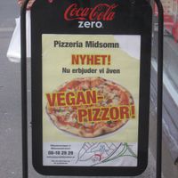 Visible sign of vegan pizzas outside! at Pizzeria Fellini in Stockholm