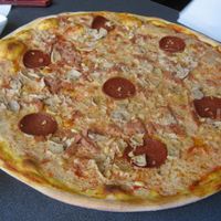 'Gullefjun' with chi chi ('chicken'), pepperoni, 'ham', pine seeds and guacamole at Pizzeria Fellini in Stockholm