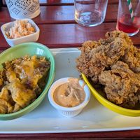 None fried chicken with vegan Mac and cheese, chipotle sauce and vegan coleslaw. at Evoden in Manchester