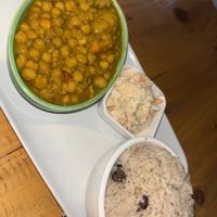 Chickpea curry with rice and pea and coleslaw   at Evoden in Manchester
