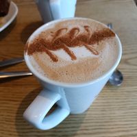 Spiced pecan oat latte with cinnamon sprinkle at Caffe Nero in Castlebar