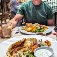 Delicious homemade tortilla with veggie chilli and yummy salads. at Amandines in Diss