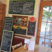 Menu and kitchen area at Amandines in Diss