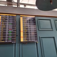 It shows flights on the screens  at STN - The Windmill in Stansted