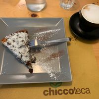 Vegan chocolate cream tart and oat milk cappuccino  at Chiccoteca in Pesaro