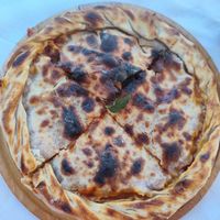 Tomato onion pie at Mëndra in Ksamil