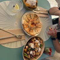 Patatas fritas con queso y trufa,  hummus y esalada con tofu at LUMA in Viana Do Castelo