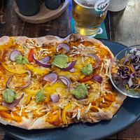 Pinsa „Holy Guacamoly“   at Dijo Restaurant & Bar in Prerow