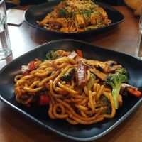 Fried udon noodles and spicy noodles at the back at Sen Chay in Helsinki