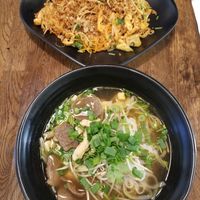 Veggie pho in the front and spicy noodles in the back at Sen Chay in Helsinki