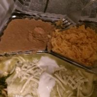 Vegan Enchilada Suiza
(flour tortilla filled with sauteed mushrooms, broccoli, zucchini, carrots, and spinach, topped with green sauce, vegan cheese and vegan sour cream served with beans and rice)
I took a bite and almost forgot to take a picture at Habanero's Bar and Grill in Scotts Valley