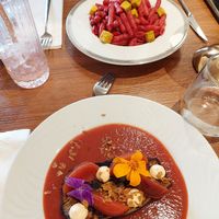 Aubergine/plum (down), Beetroot pasta with chickpeas and tofu (up) at Vrasserie in Porto